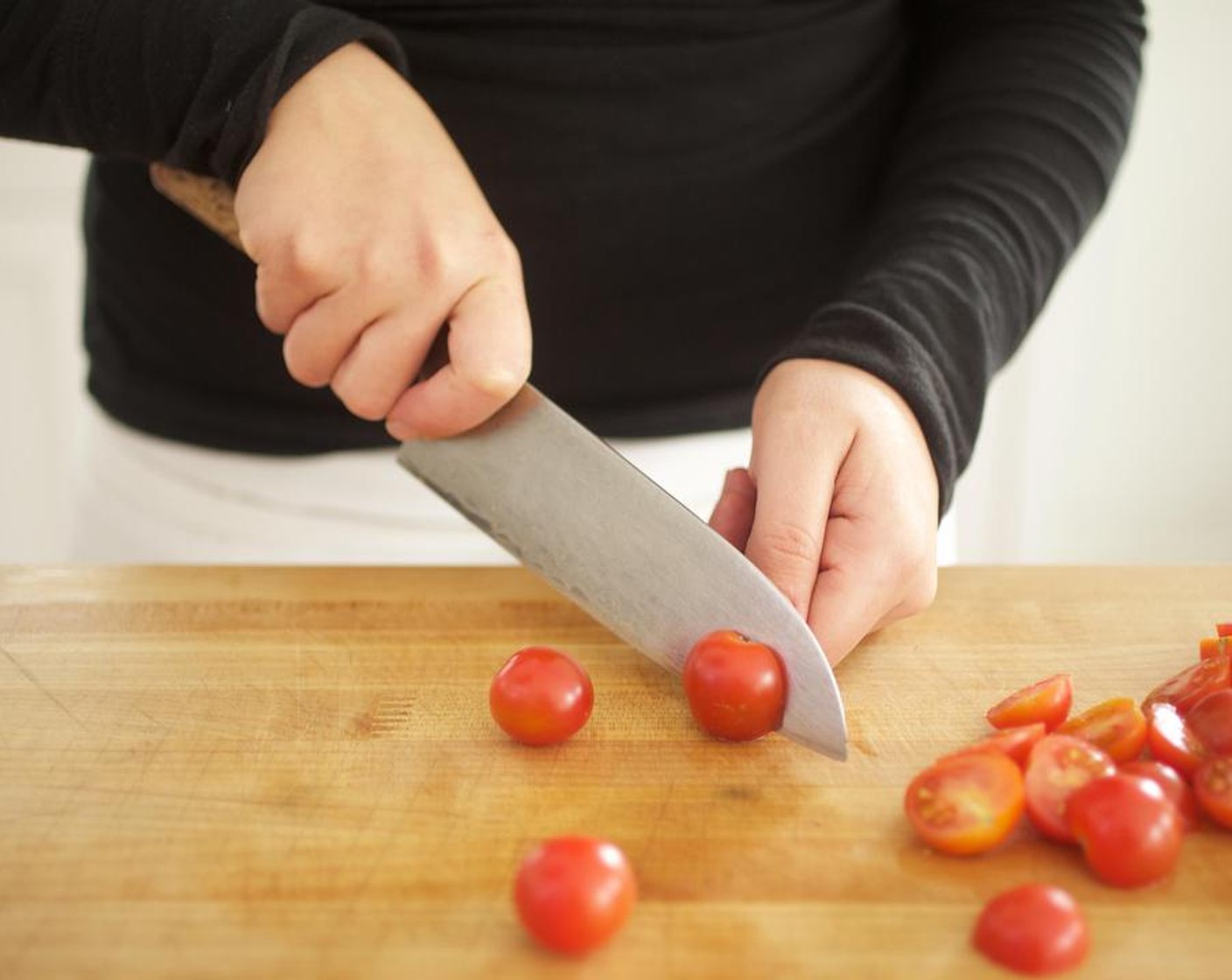 step 2 Cut Cherry Tomato (1 cup) in half and set aside.