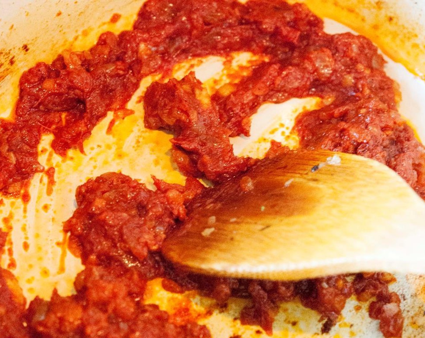 step 7 Stir in Tomato Paste (2 Tbsp) and cook.