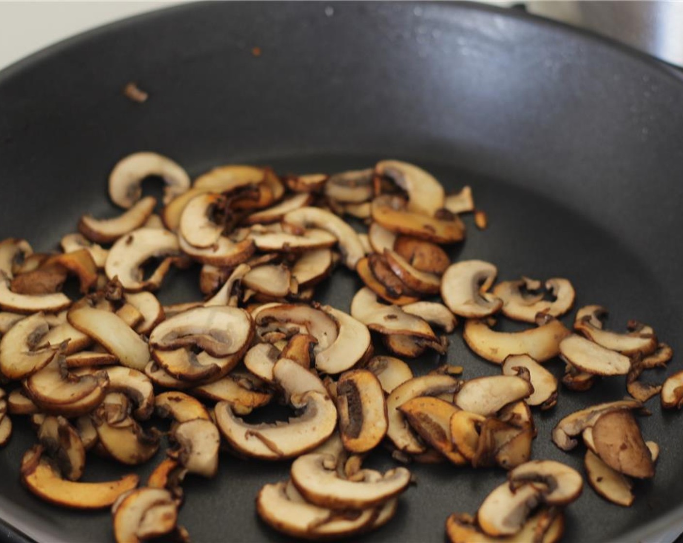 step 4 Spray the same pan with Coconut Oil Cooking Spray (as needed) then sauté mushrooms at high heat until browned, 5-6 minutes. Set aside into the bowl of beef.