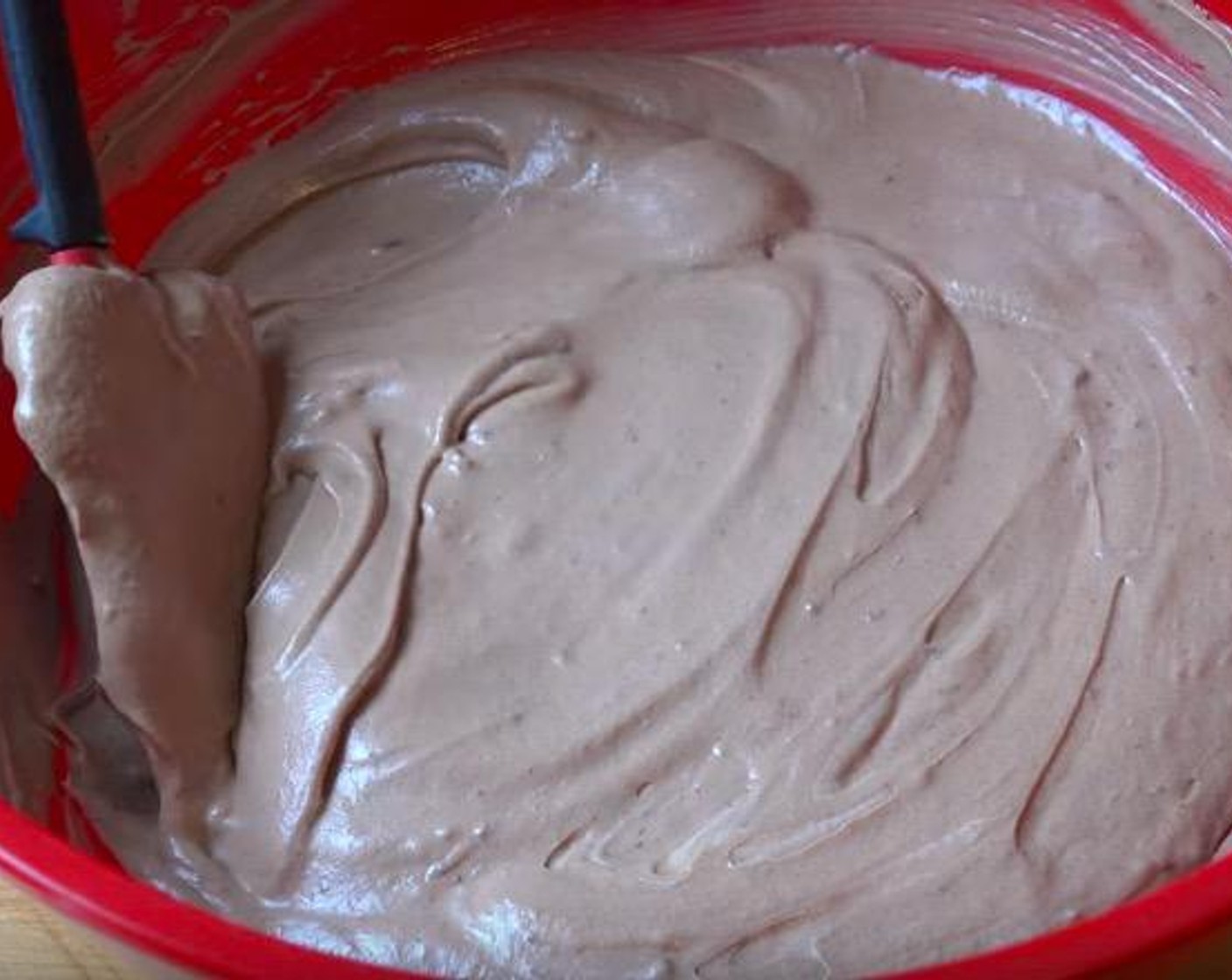 step 3 Add the Nutella mixture into the whipped cream and beat until smooth.