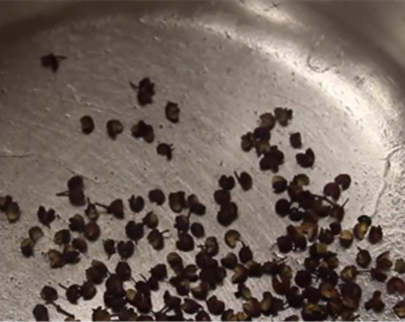 step 1 First, make the Sichuan peppercorn oil by toasting Sichuan Peppercorns (1 tsp) for about two minutes on low heat.