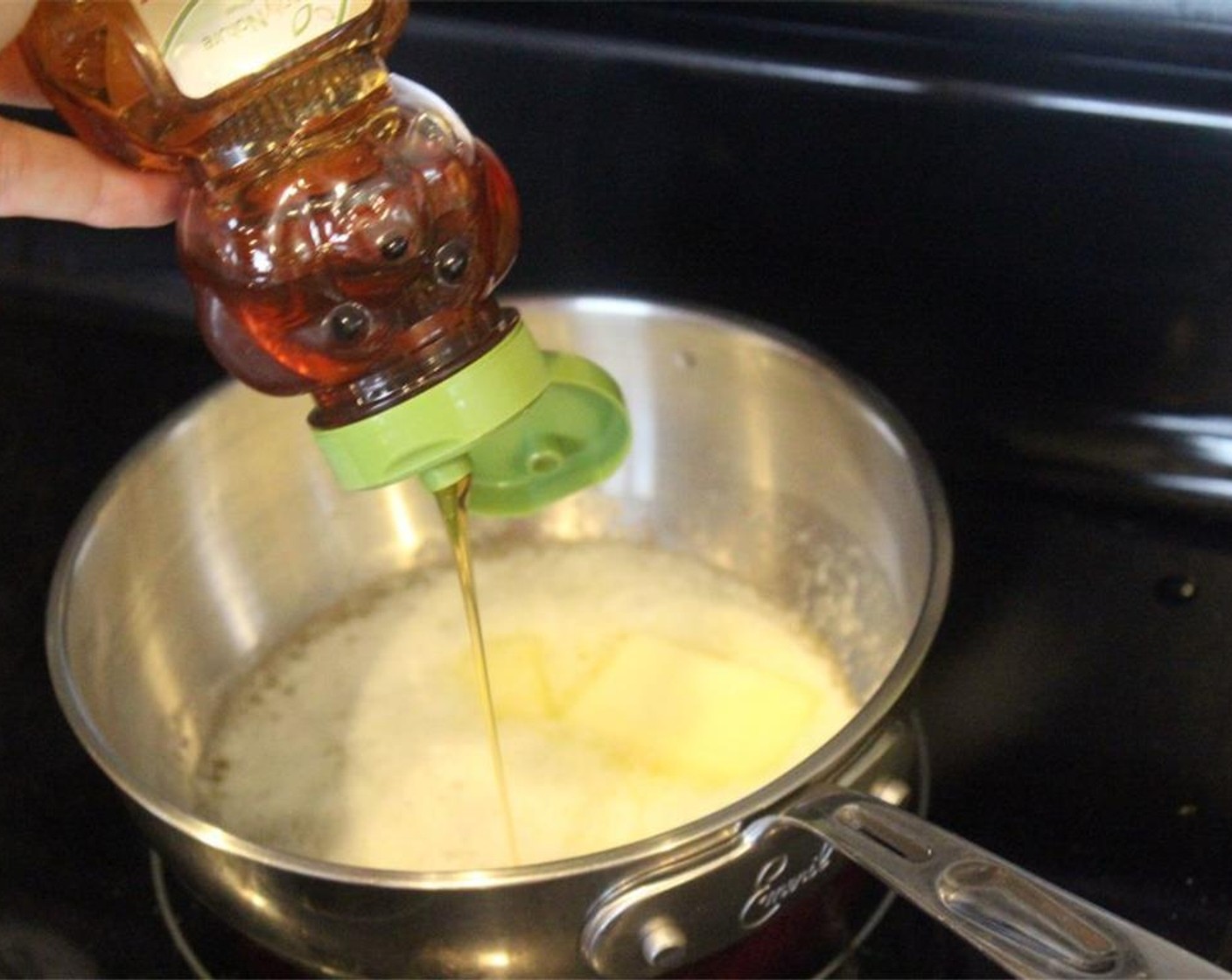 step 6 Once the butter has melted, add the Honey (1/4 cup) and Vanilla Extract (1 tsp).