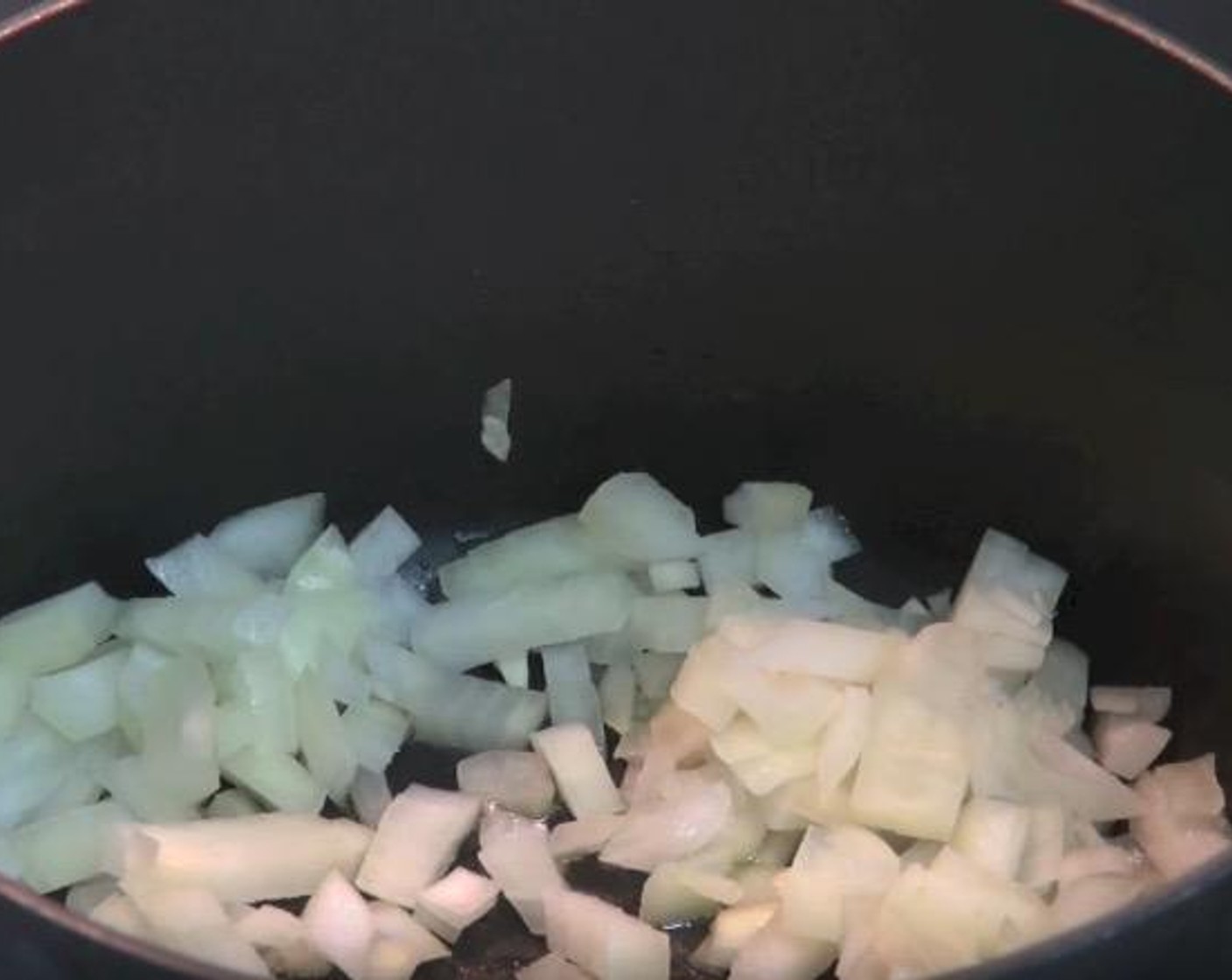 step 1 In a saucepan, add Olive Oil (1 Tbsp) and Yellow Onion (1). Cook over a medium-high heat for 2-3 minutes, or until the onions have softened.