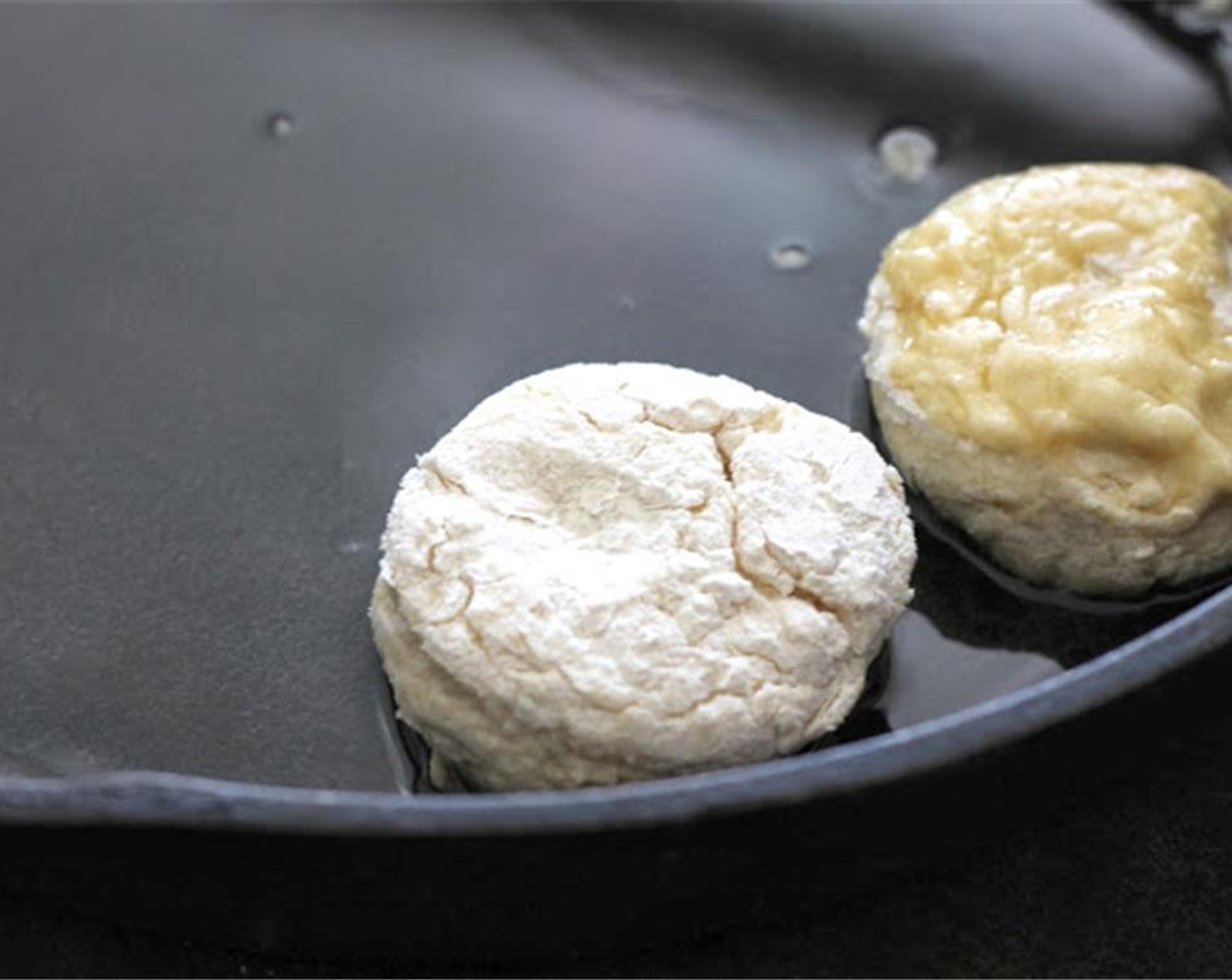 step 8 Place the biscuits into the pan (place them in, and turn them over, allowing the shortening to lightly coat the topside of them). Place your biscuits right up next to each other. This will create a taller, more moist and tender biscuit.