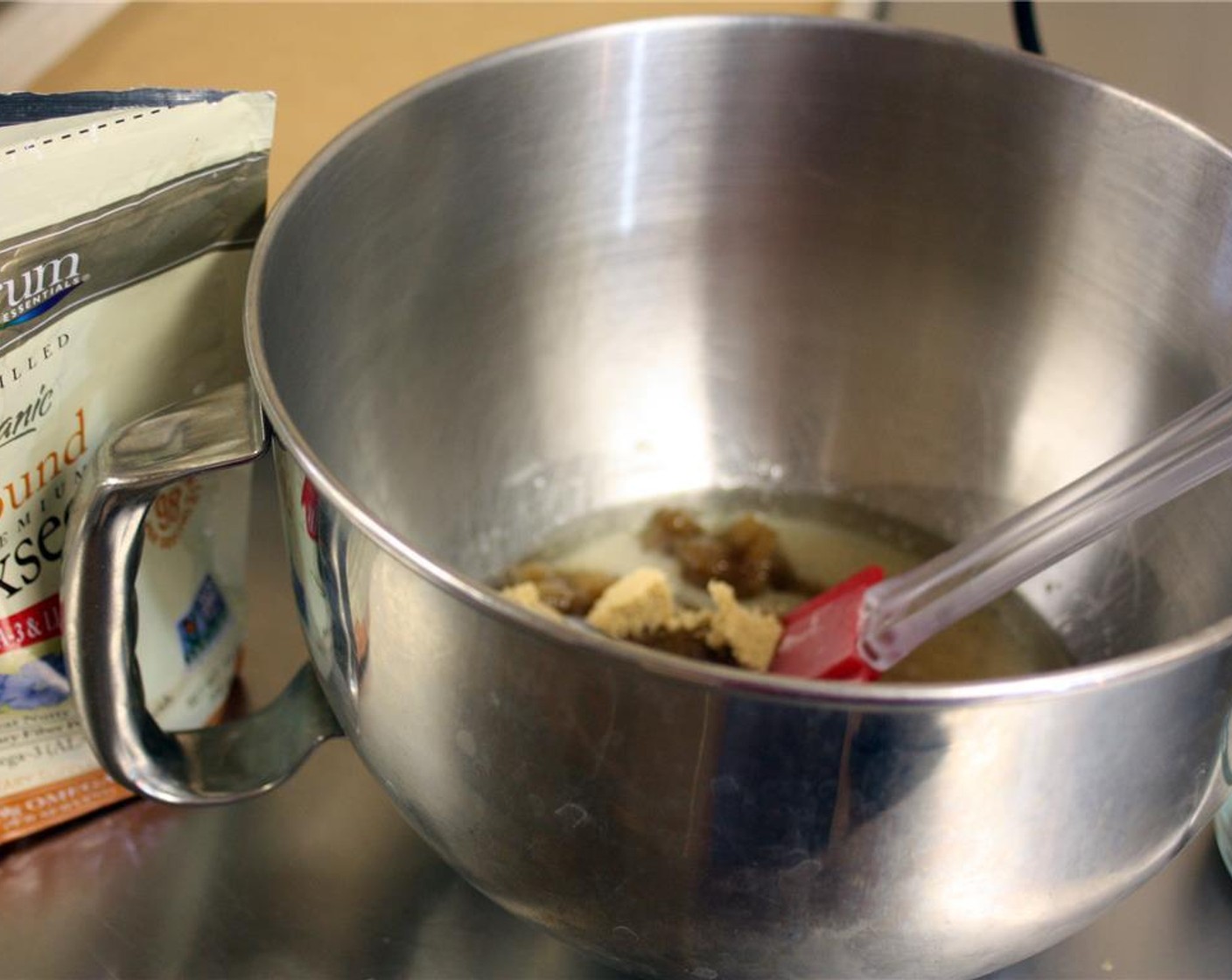 step 5 In a separate bowl, combine Brown Sugar (3/4 cup), Granulated Sugar (2/3 cup), Canola Oil (2/3 cup), Unsweetened Rice Milk (1/2 cup), Ground Flaxseed (1 Tbsp), and Vanilla Extract (1 tsp).