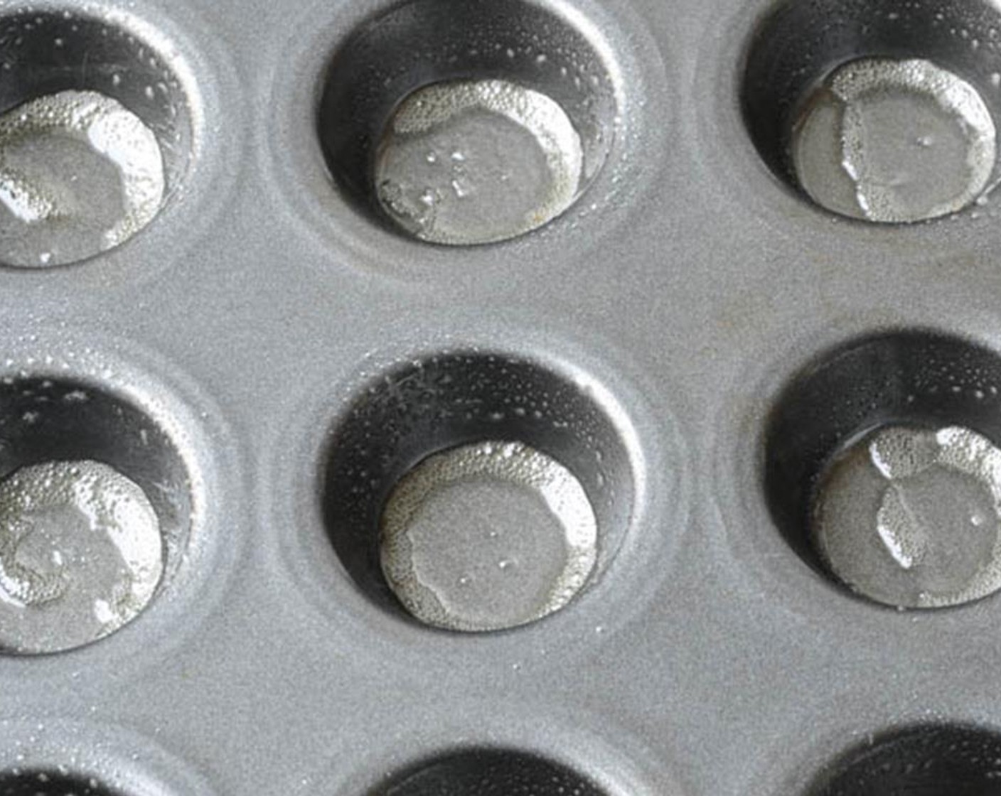 step 2 Spray a mini muffin tin with vegetable spray and set aside.