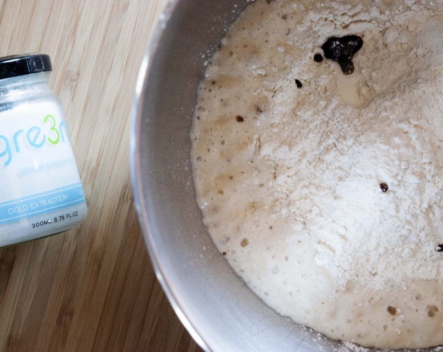 step 5 Stir the Water (3 Tbsp) and Flaxseeds (1 Tbsp) together then set aside for 10 minutes. Add in the flax mix, All-Purpose Flour (3 cups), Soy Milk (9 oz), Cane Sugar (1/3 cup), Coconut Oil (4 Tbsp), zest of the Orange (1), Salt (2 tsp), and Vanilla Bean Paste (1/2 tsp) to the bowl with the batter.