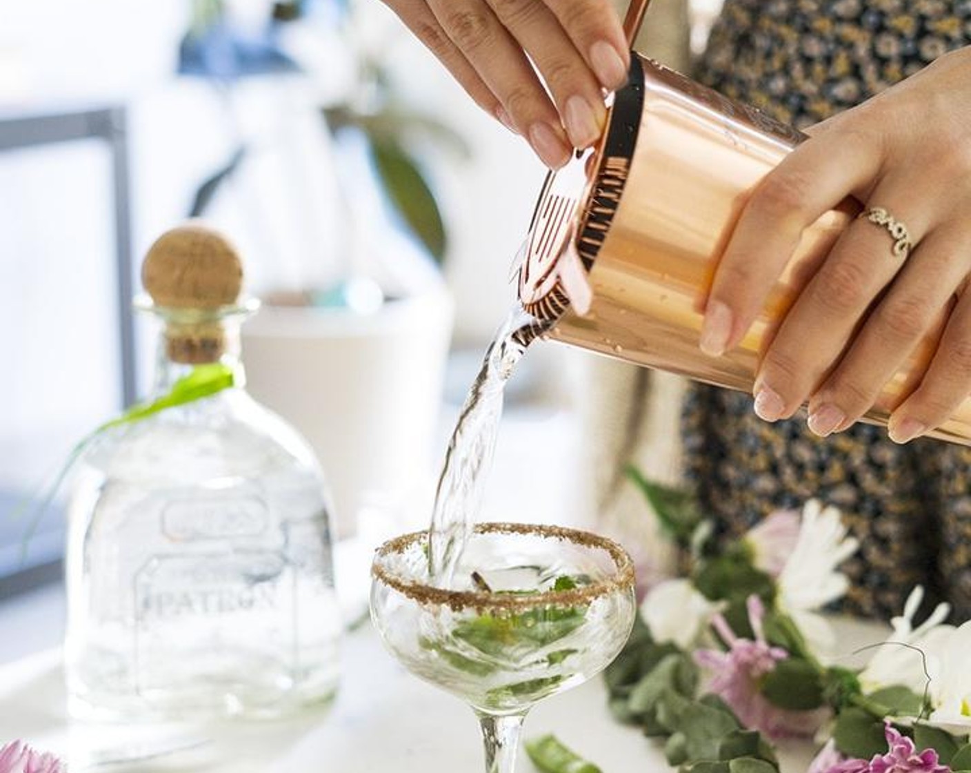 step 4 Use a fine strainer to strain into a glass rimmed with Toasted Pumpkin Seed Oil (as needed) and Smoked Salt (as needed).