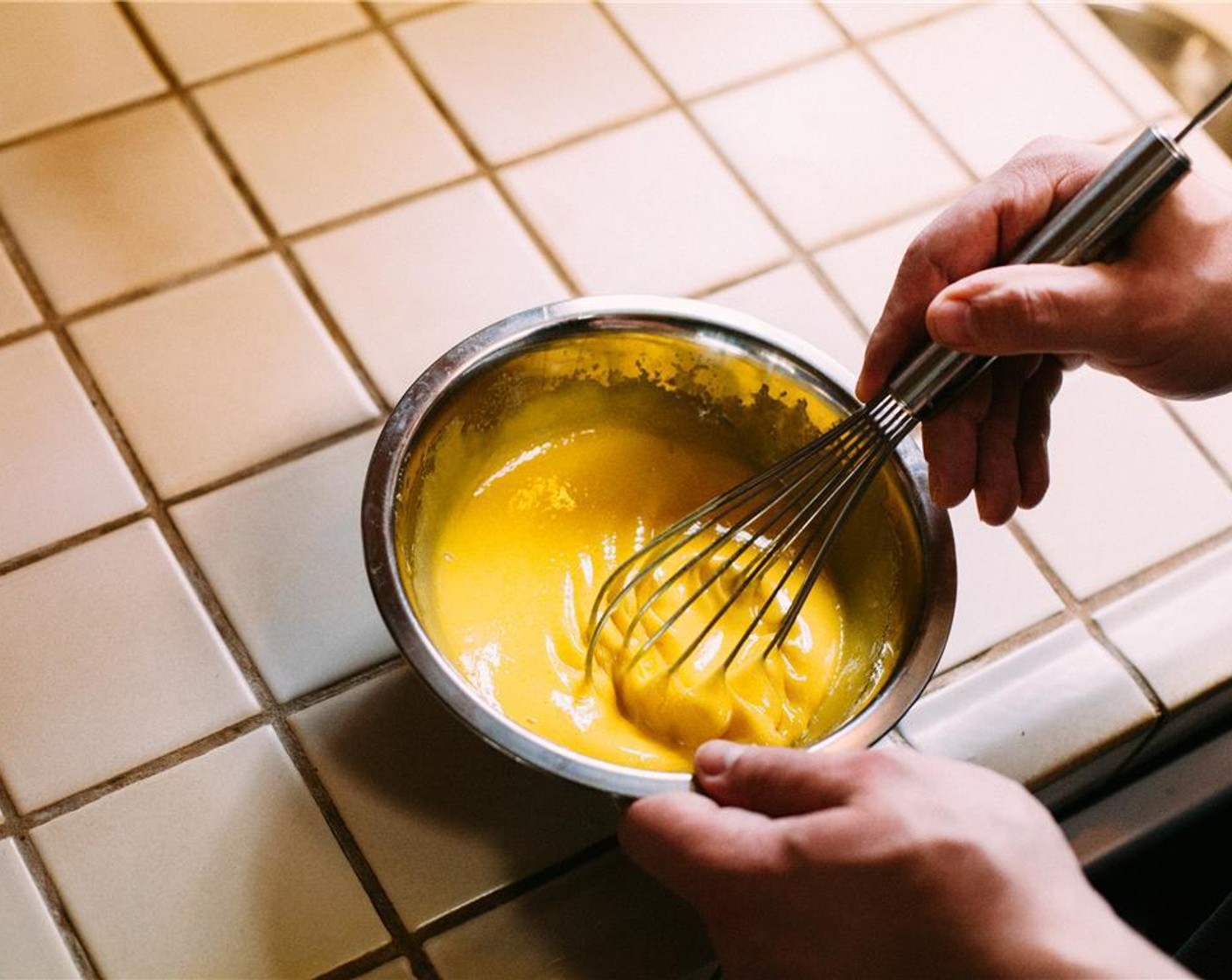 step 2 Meanwhile, in a medium bowl, whisk Eggs (8) and remaining sugar until smooth, heavy, and pale yellow, about 30 seconds.