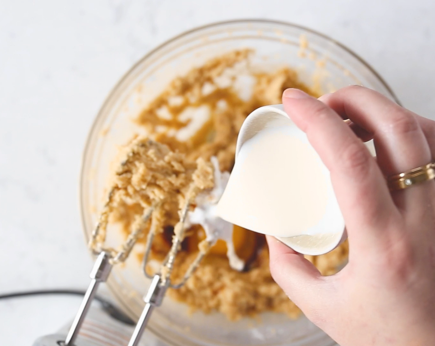 step 2 Add the Eggland's Best Classic Eggs (2), Whole Milk (2 Tbsp), and Vanilla Extract (1 Tbsp) and continue mixing until combined.