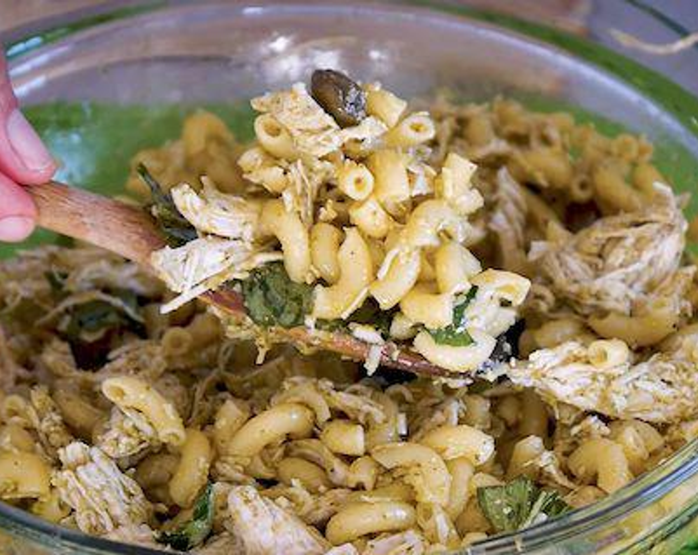 step 2 Place pasta in a bowl and add Boneless, Skinless Chicken Breast (1), Basil Pesto (1/3 cup), Grated Parmesan Cheese (1/2 cup), Olive Oil (to taste), Capers (to taste), and season with Salt (to taste) and Ground Black Pepper (to taste).