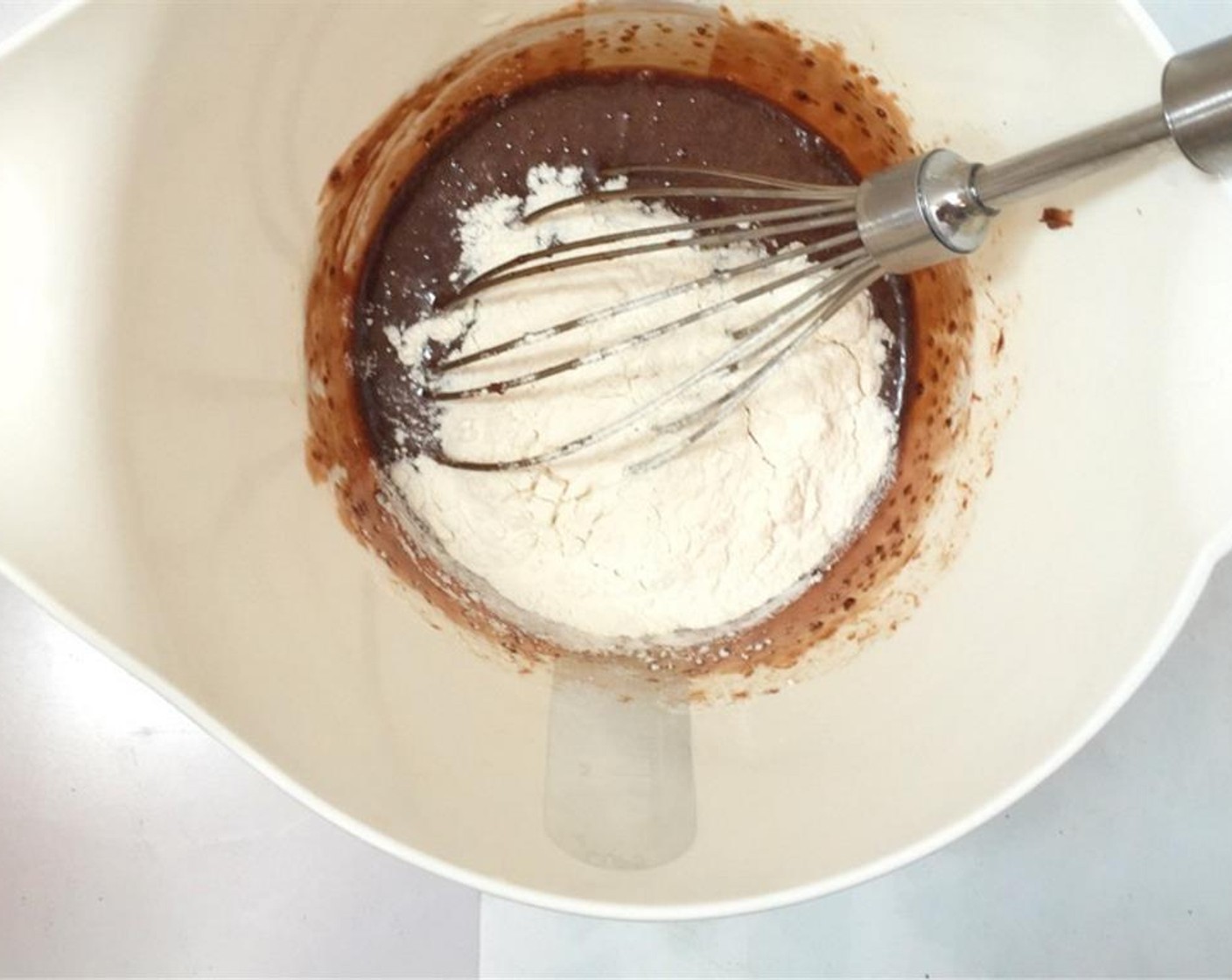 step 3 Whisk well again. Then add the sifted the Self-Rising Flour (1/4 cup).