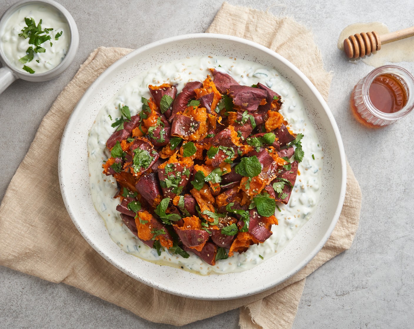 Spicy Roasted Sweet Potatoes with Herb Yogurt Sauce