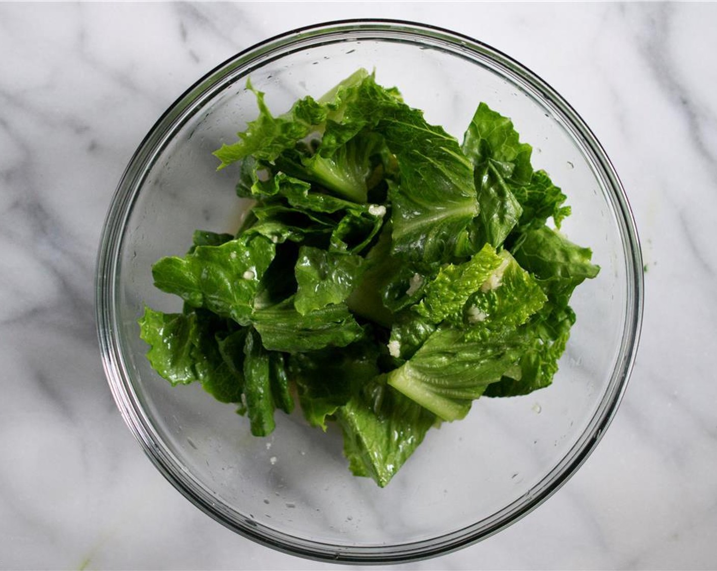 step 6 Toss in the Romaine Lettuce (1 1/4 cups) to coat.  Set aside until ready to use.