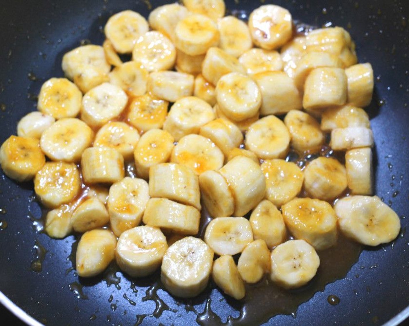 step 4 Add the cut bananas, stir until coated, and remove them from the heat.