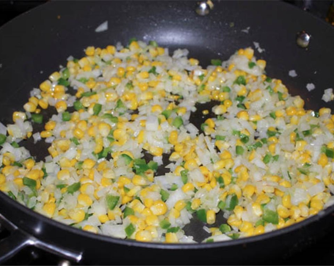 step 6 Add the onions, garlic and jalapenos and cook until the onions soften and the garlic becomes fragrant, about 2 minutes.