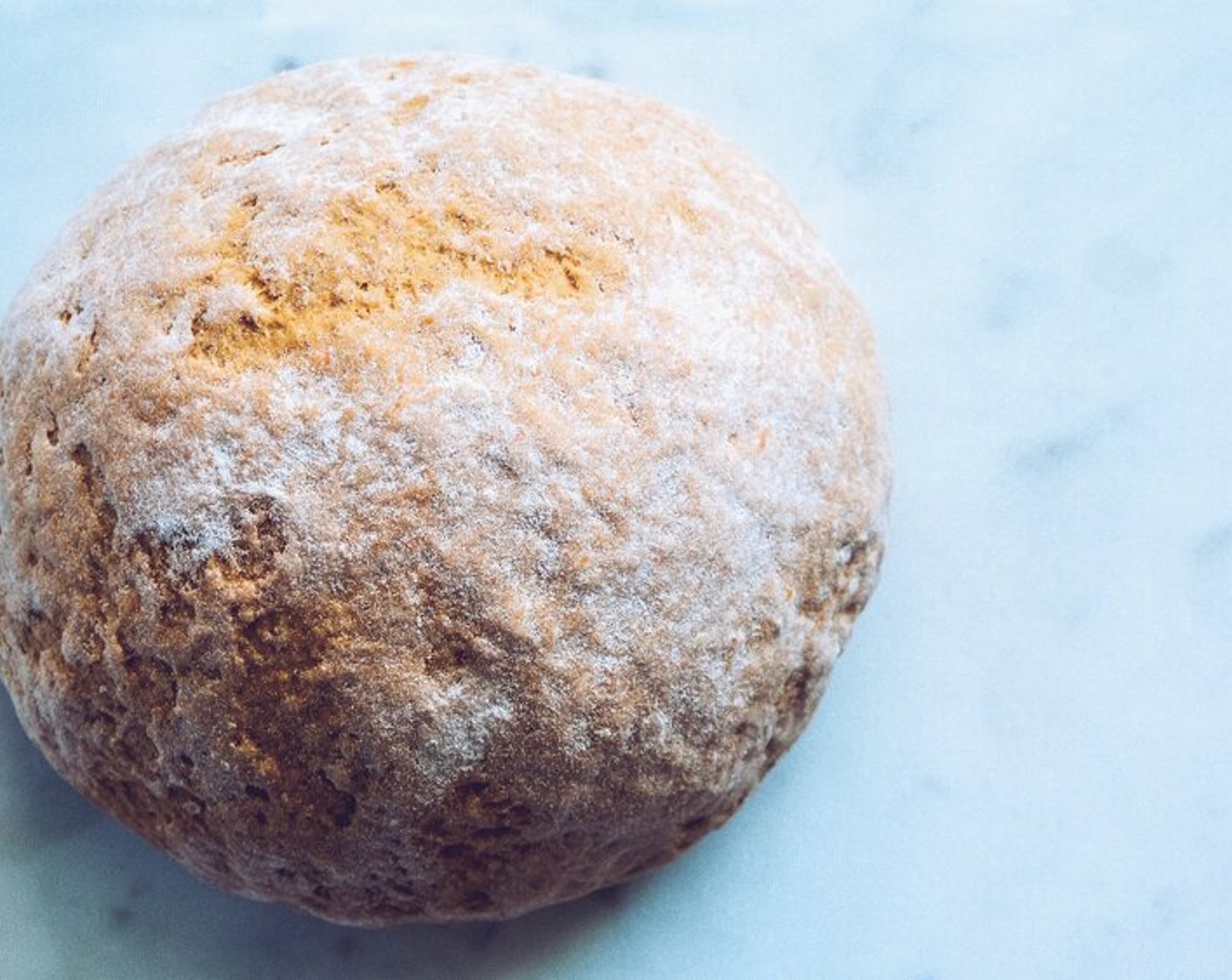 step 8 Roll the dough into a ball on a lightly floured surface and divide into 8 pieces. Flour your hands regularly and use them to gently roll out the pieces into a “long-cigar” shape.