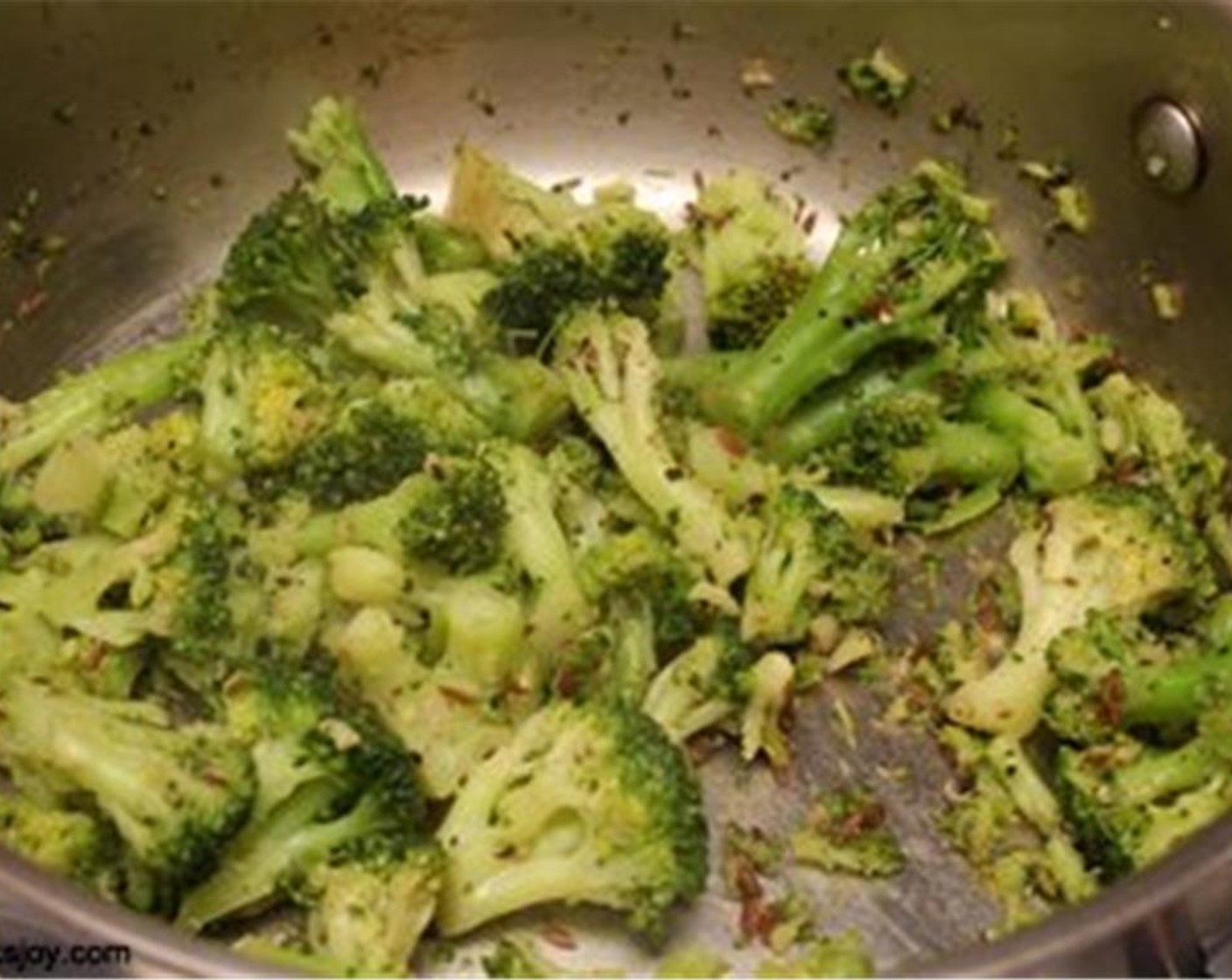 step 7 Heat Olive Oil (1 tsp) and add Cumin Seeds (1/2 tsp). Add Broccoli Florets (2 cups) and Soy Sauce (1 tsp) and cook until broccoli is tender. Taste and season with Salt (to taste).