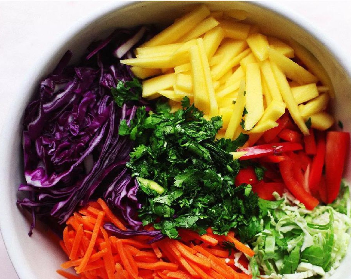 step 1 Add Red Cabbage (3 cups), Carrots (2 cups), Brussels Sprouts (1 cup), Fresh Cilantro (1 cup), and Mango (1) in a medium or large bowl.
