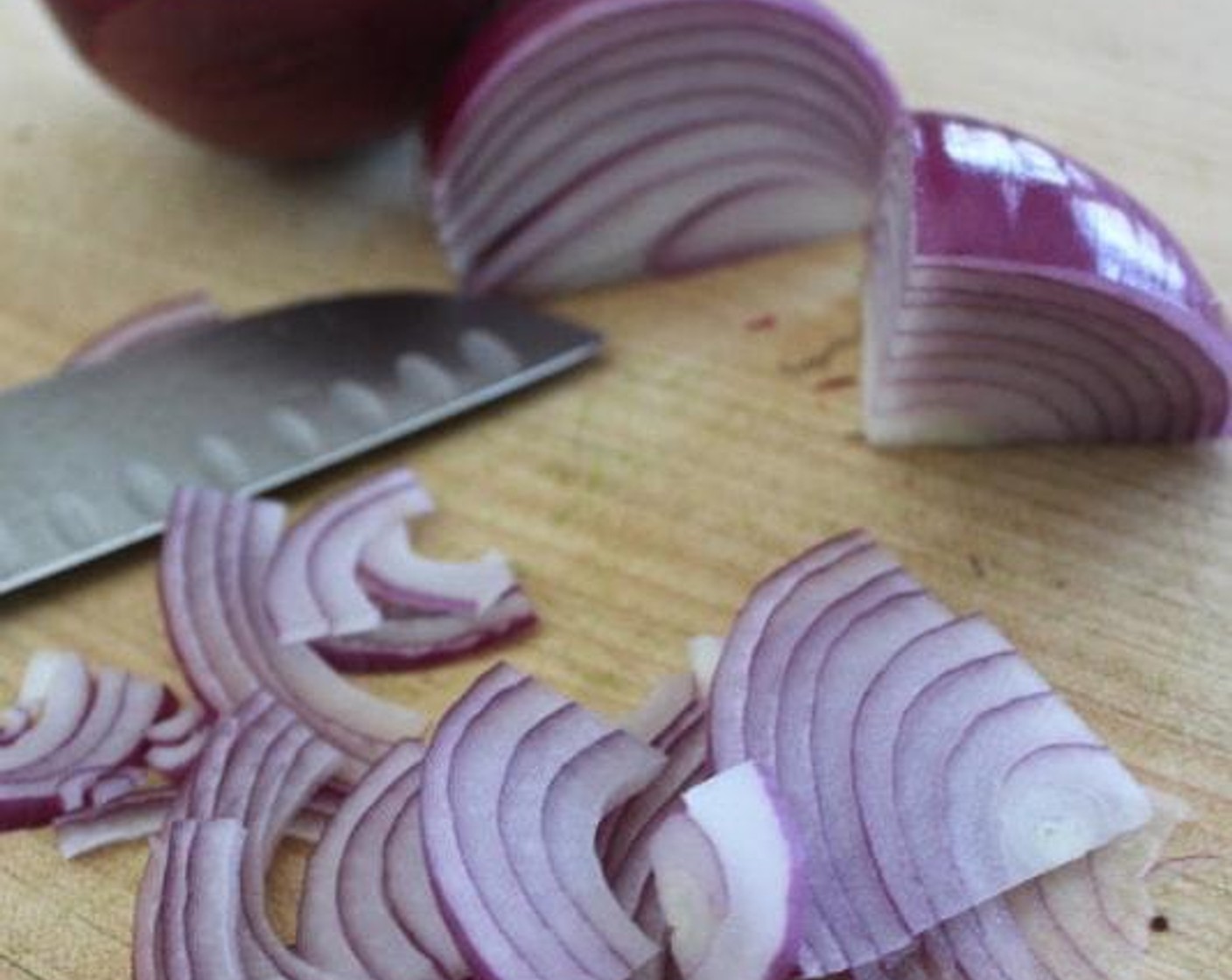 step 6 Place the Red Onion (3/4 cup) in a mesh strainer or colander and rinse under warm tap water for 30 seconds to remove some of their “bite.” Drain and set aside.