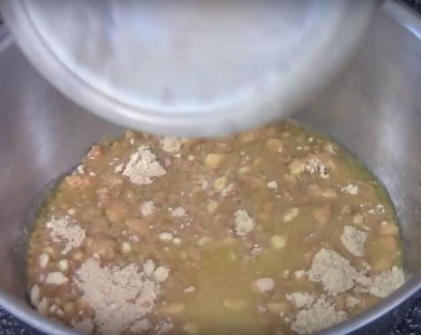 step 1 Put Graham Crackers (3 cups) into a bowl. Add Butter (7 oz) and mix them together. Pour the mix into a tin, and press it down with a glass. Push the crumbs up at the edges slightly. Place it into the fridge for fifteen minutes.