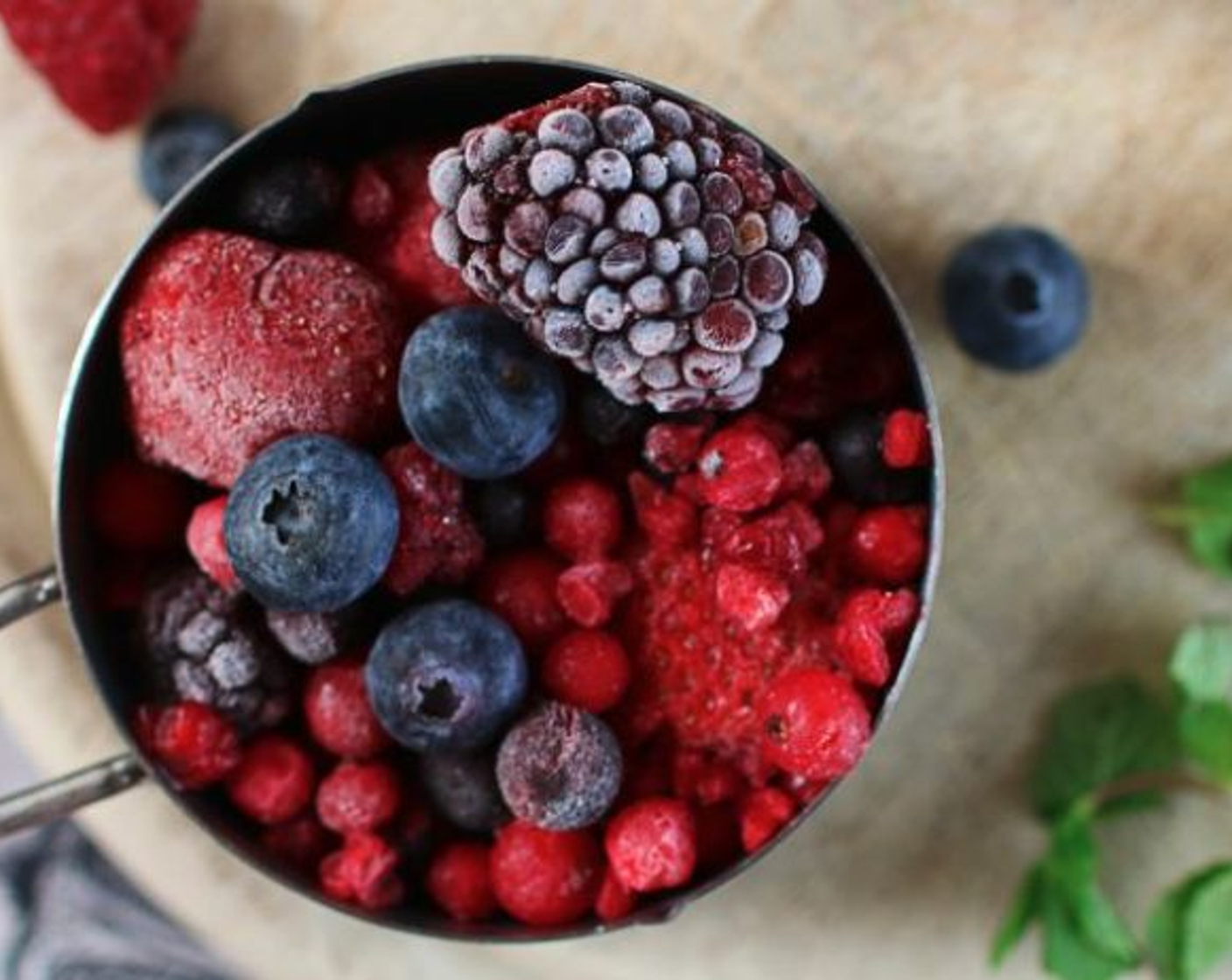 step 1 Place Frozen Mixed Berries (2/3 cup), Bananas (2), and Unsweetened Almond Milk (2 cups) in a blender, then blend until smooth.