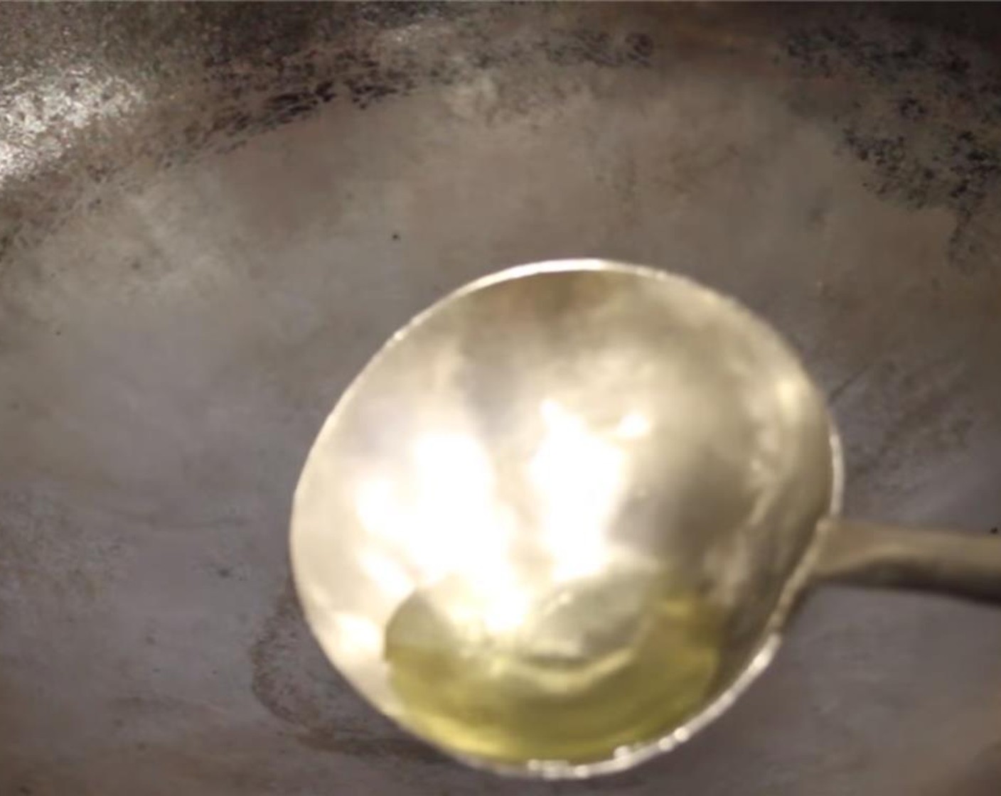 step 14 In a wok or pan, add in Vegetable Oil (2 Tbsp). Turn fire down to the lowest setting.