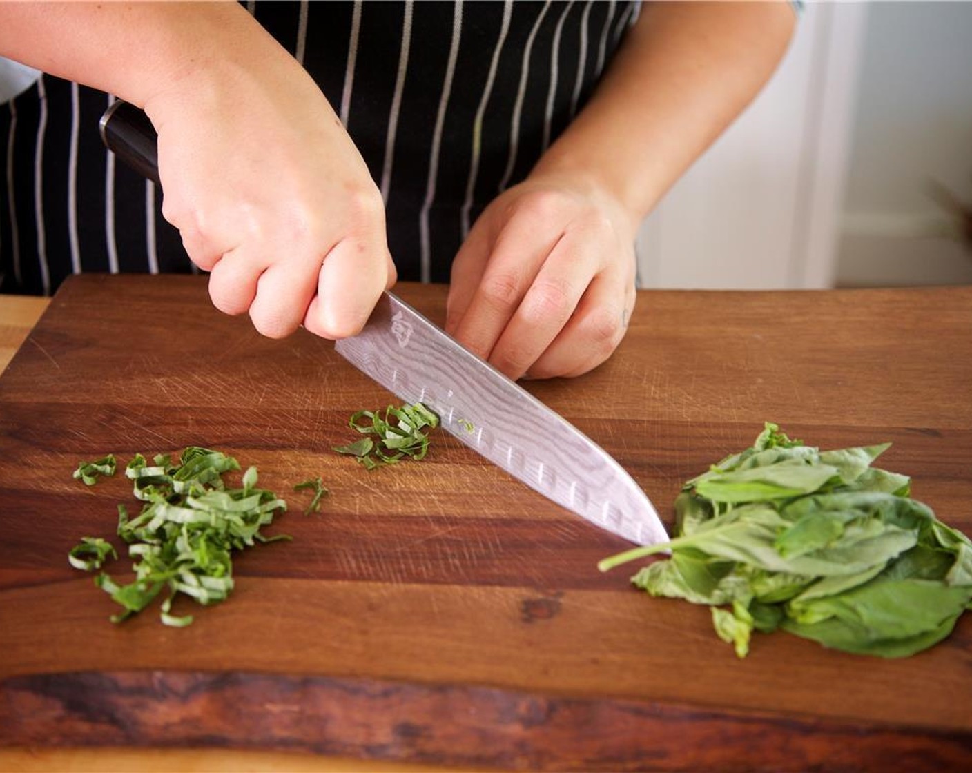 step 4 Remove Fresh Basil (2/3 cup) leaves from their stems. Chiffonade the basil by stacking leaves into a neat pile. Roll the leaves lengthwise tightly into a cigar shape and slice very thinly across. Fluff the chiffonade with your fingers and place in a small bowl.