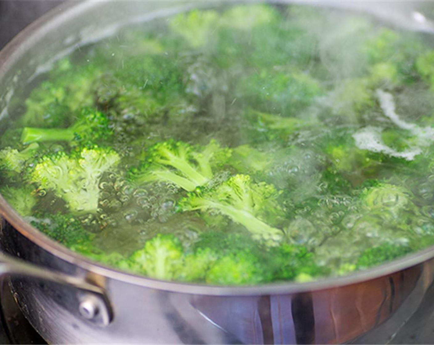 step 3 Cut the Broccoli (3 heads) into florets. Bring a pot of water to a boil. Blanch the broccoli by throwing the florets into the boiling water until bright green and still crisp, 1 to 2 minutes.