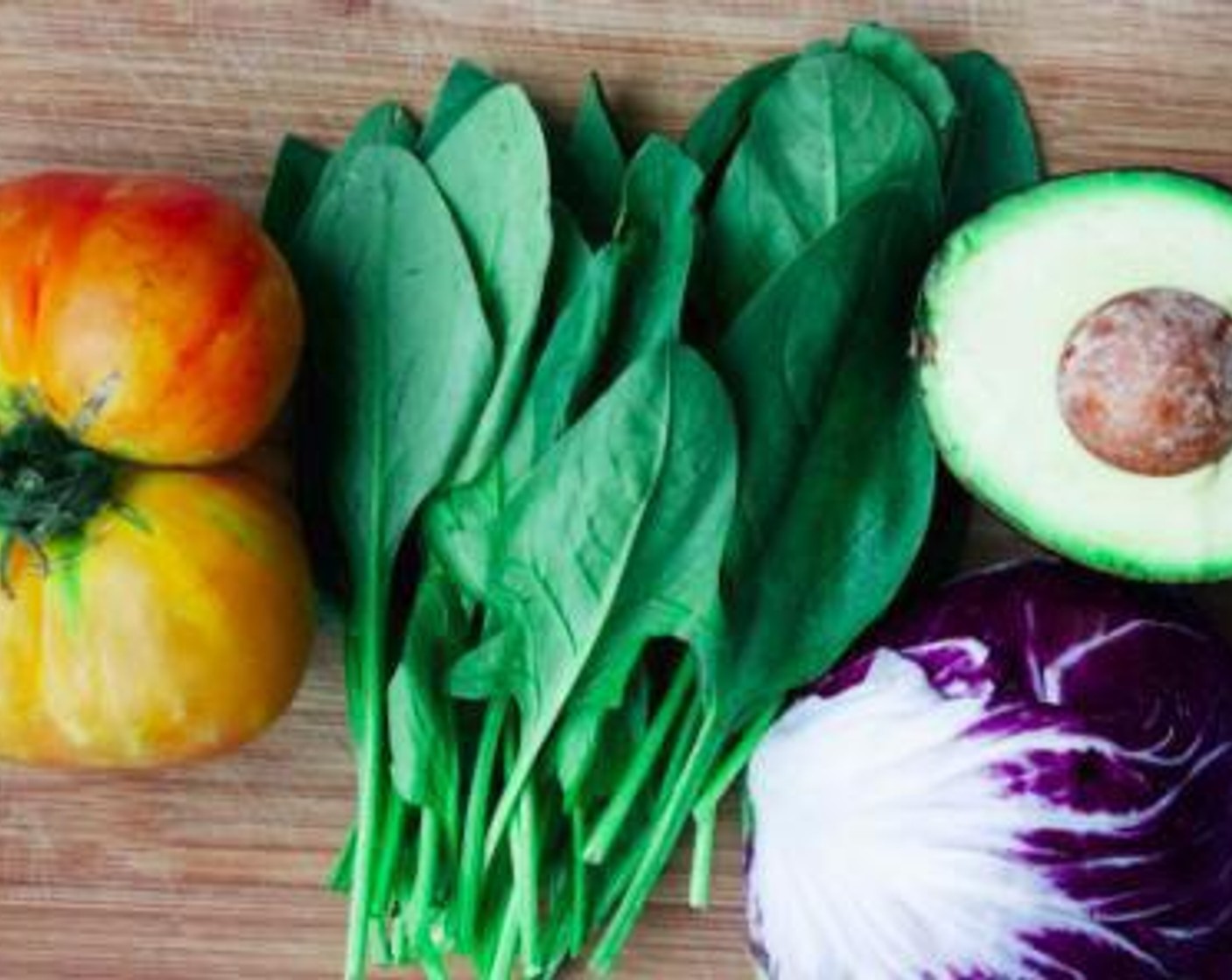 step 1 Wash and pat dry the Fresh Baby Spinach (1 2/3 cups), dice the Heirloom Tomato (1/2) and Avocado (1/4 cup), and shred the Radicchio (1/3 cup).