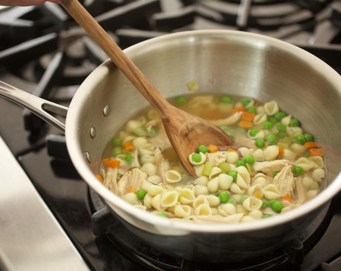 step 7 Add the chicken and Green Peas (1/2 cup) with Salt (1/2 tsp), bring back to a quick boil. Remove from heat and keep warm until plating.