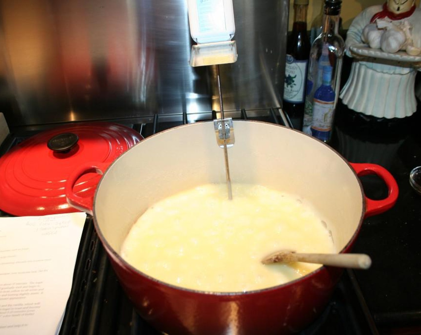 step 3 Add your Unsalted Butter (2 cups) and Salt (1 tsp) to pot and melt completely then slowly add your Granulated Sugar (2 cups) while stirring continually. Add your Water (1 Tbsp) and Light Corn Syrup (1 Tbsp) and continue to stir. The sugar will at first sink to the bottom of the pot. It will gradually melt and begin to incorporate into the butter. Then the mixture will begin to turn to look like taffy and change color.