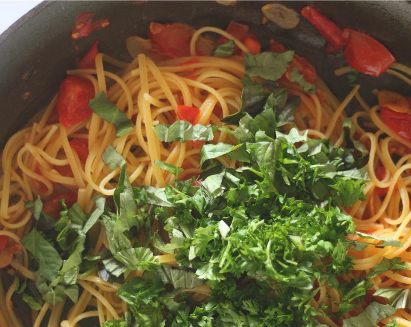 step 8 When al dente, remove from the heat and toss in the parsley, basil, and Lemon (1). Add salt, if desired.