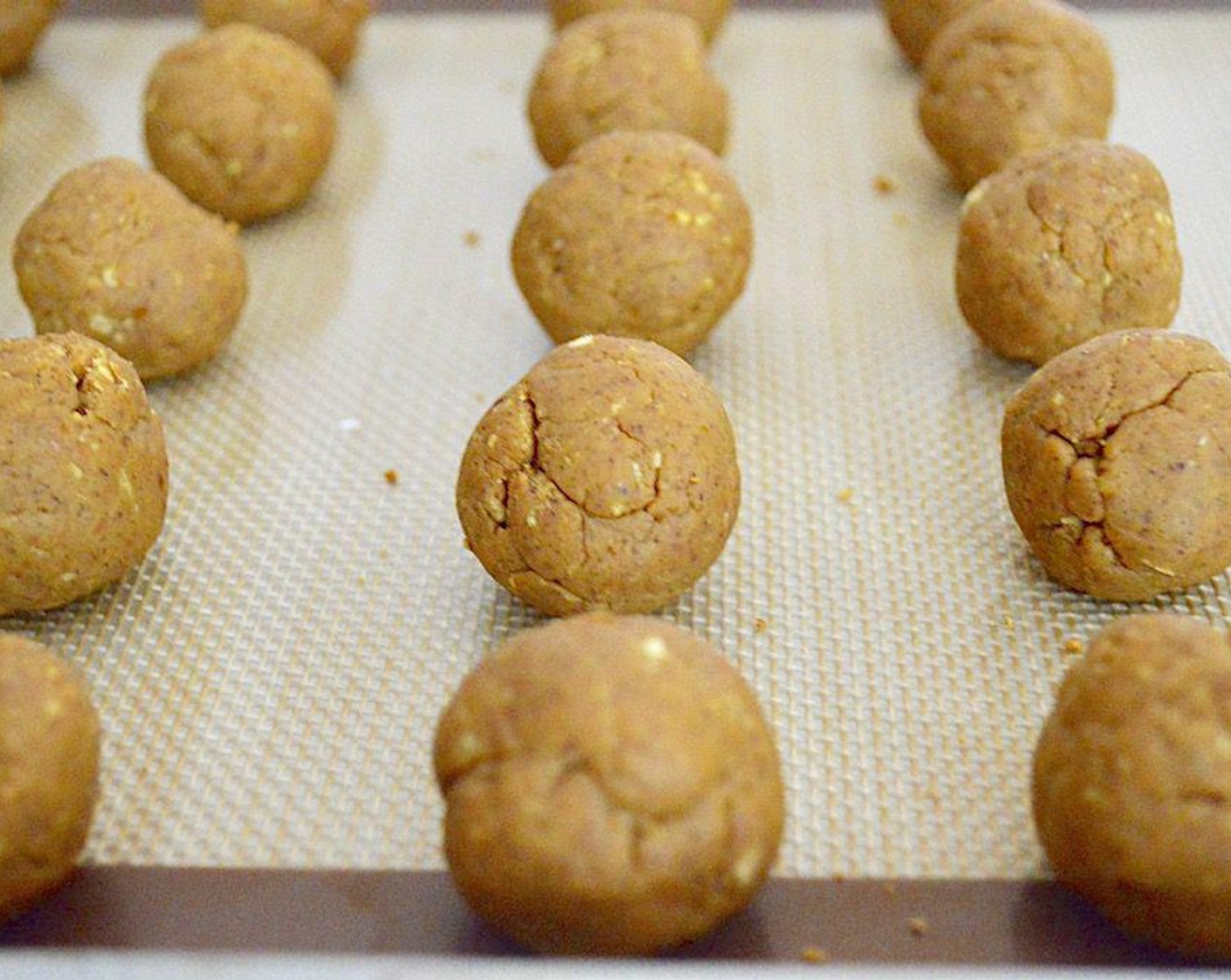 step 4 Use a tablespoon to scoop out perfect little mounds of the filling. Roll them into little balls and line them up on the mat.