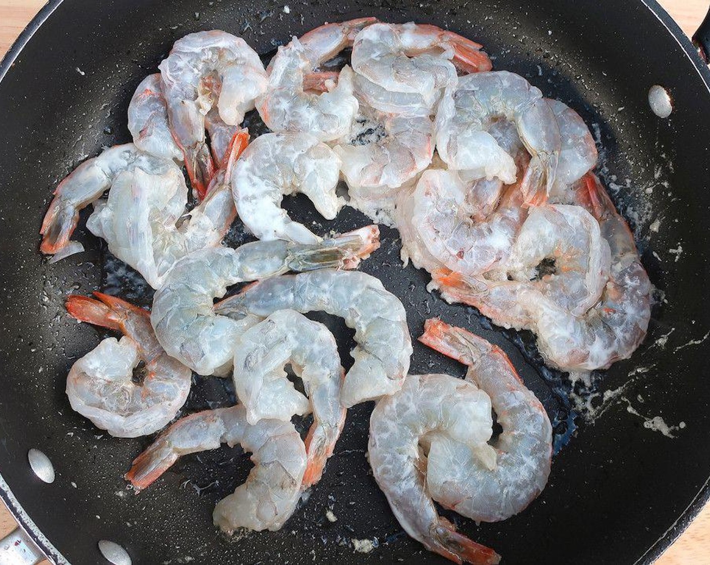 step 4 Saute shrimp in Butter (1/4 cup) until halfway cooked.