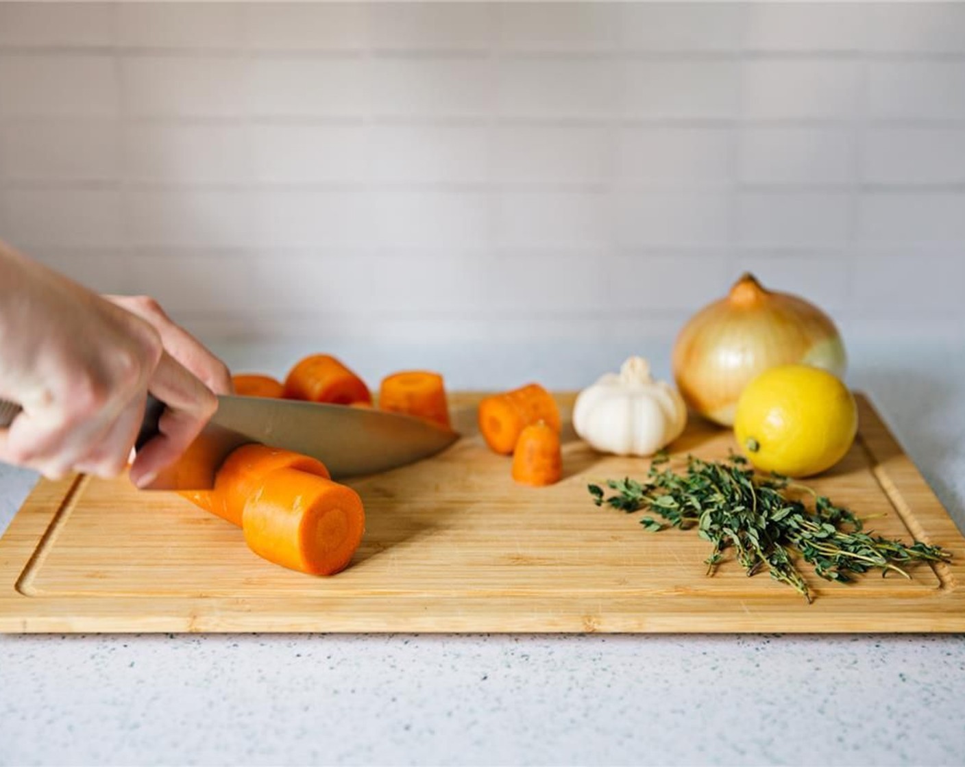 step 2 Roughly chop Carrots (2) into quarters.