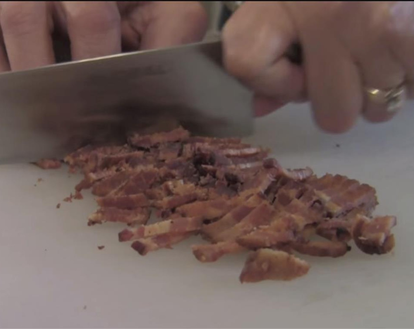 step 4 Chop up the bacon, and add it to the mixture. Stir until well blended. Spray a cookie sheet with cooking spray.