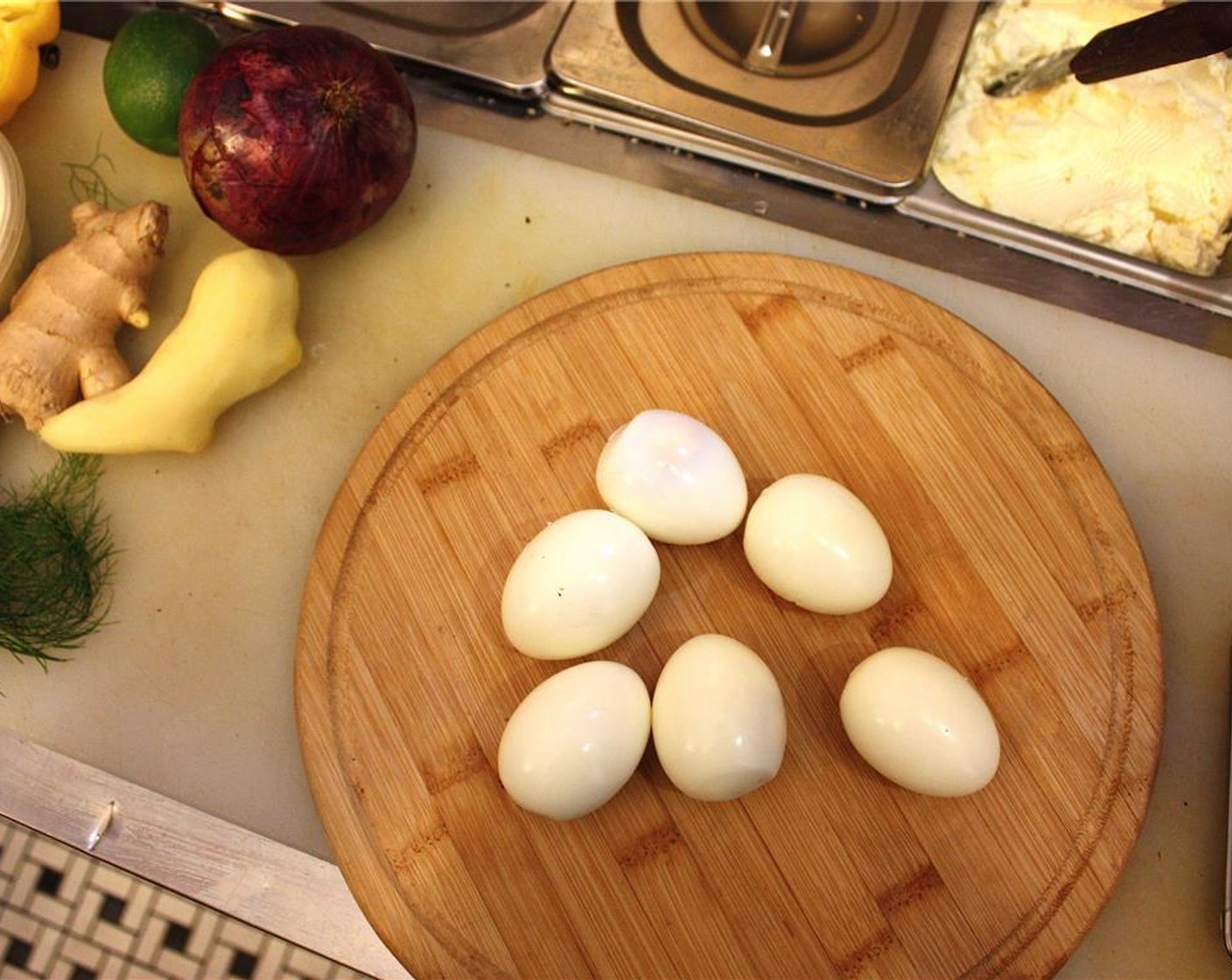 step 2 Transfer eggs to another bowl and fill bowl with enough cold water to cover eggs.  Gently crack the shells against the side of the bowl.  Let the eggs sit in the water until cool, about 30 minutes.