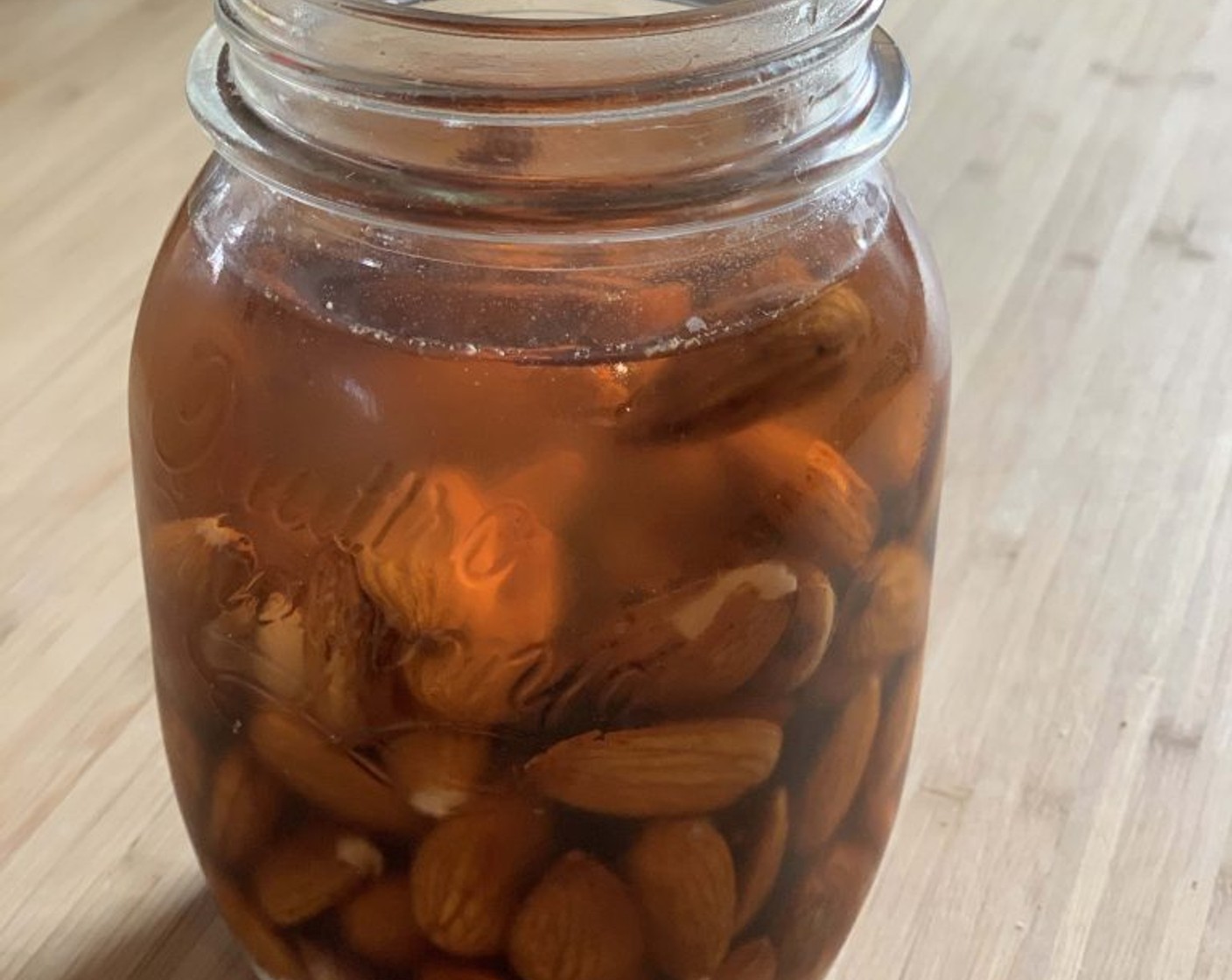 step 1 Soak the Almonds (1 2/3 cups) in water for at least 12 hours or up to 24 hours in a jar with filtered water. Then the following morning drain and rinse them, then peel off the skin (it will easily come off) and lightly toast them in the oven, just enough to dry up the almonds from excess water.