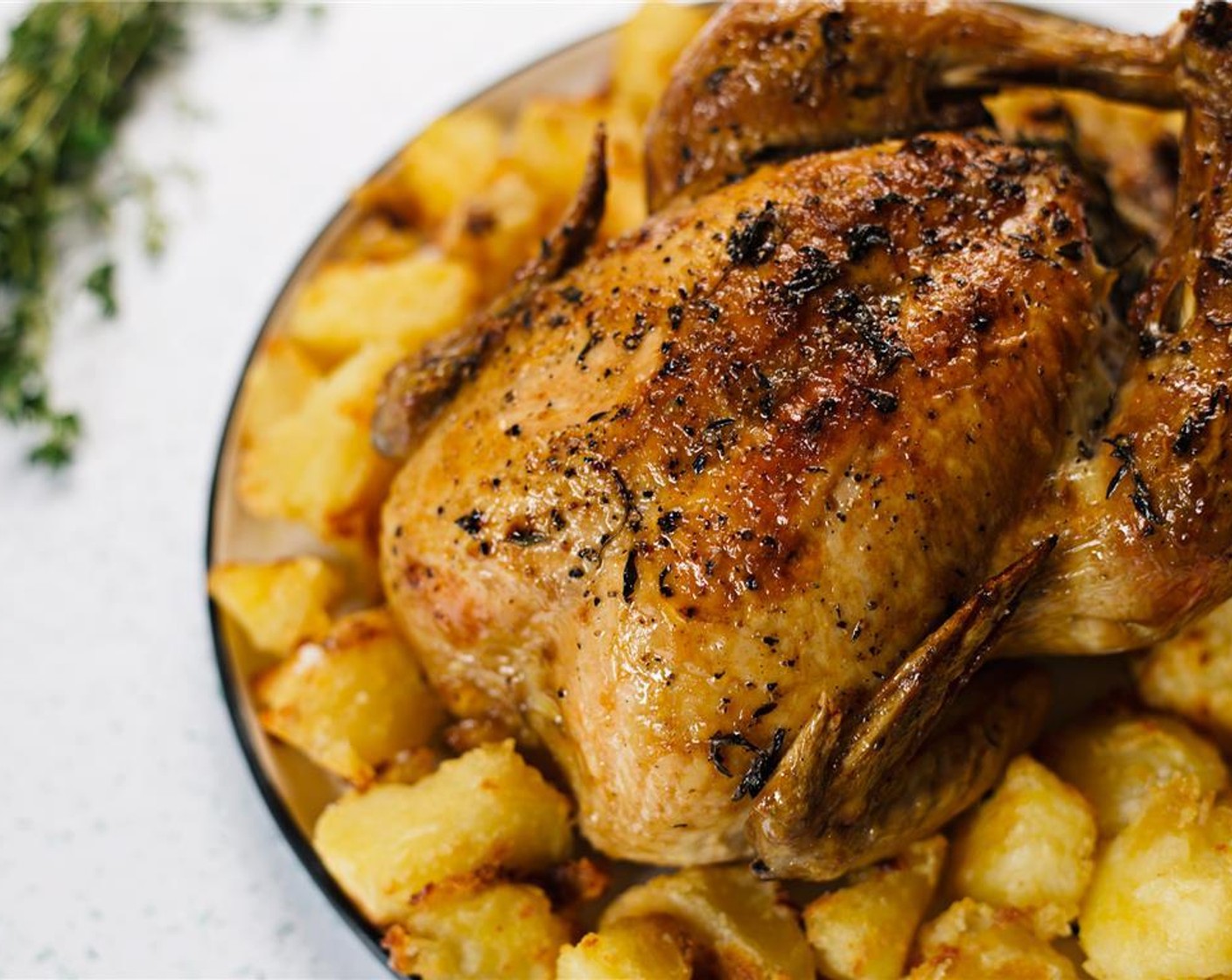 step 10 Transfer to a serving plate and surround the chicken with roasted veggies. Enjoy!