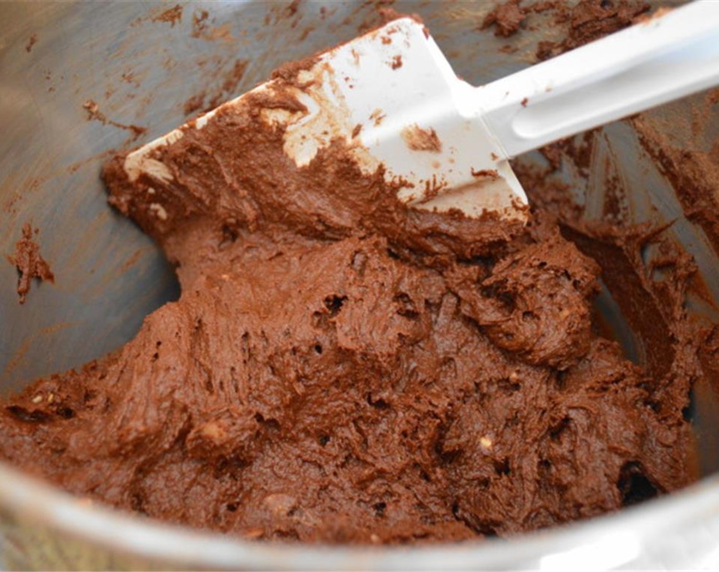 step 4 Then, beat in the Nutella® (1/2 cup). Add in Eggs (2) one at a time until they are completely mixed in. Then slowly add in the dry ingredient mixture until just combined.
