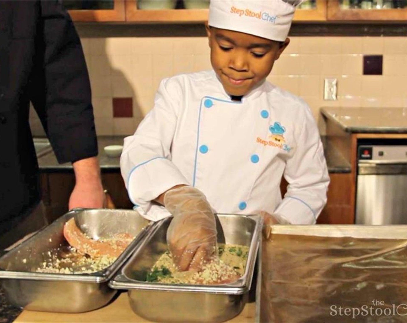 step 5 Then roll fish in the breadcrumbs & herbs mixture.  Place the breaded fish on a lined sheet pan.