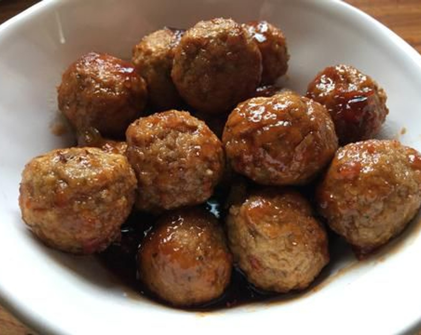 step 5 Pour the grape mixture over the meatballs and bake for 30 to 40 minutes.