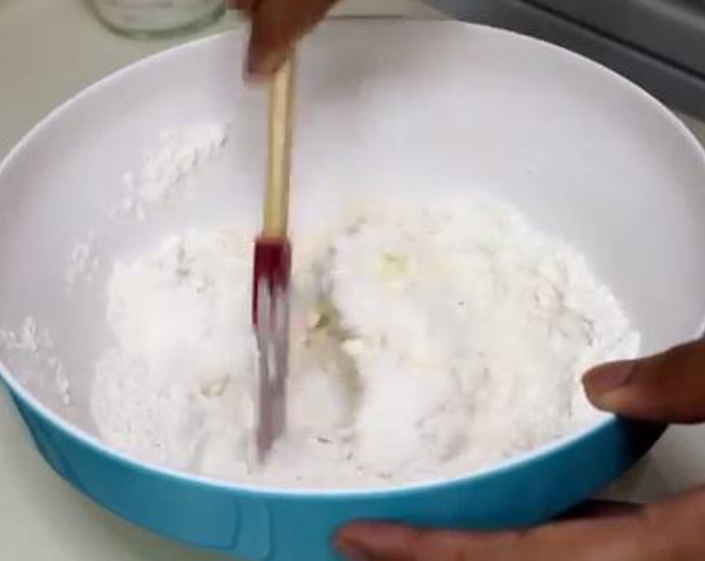 step 1 Into a large bowl, add and mix the All-Purpose Flour (2 cups), Salt (1/2 tsp), Granulated Sugar (2 Tbsp), Baking Powder (1 Tbsp), and Baking Soda (1/4 tsp). Then, add in the grated Butter (1/2 cup) and mix everything well.