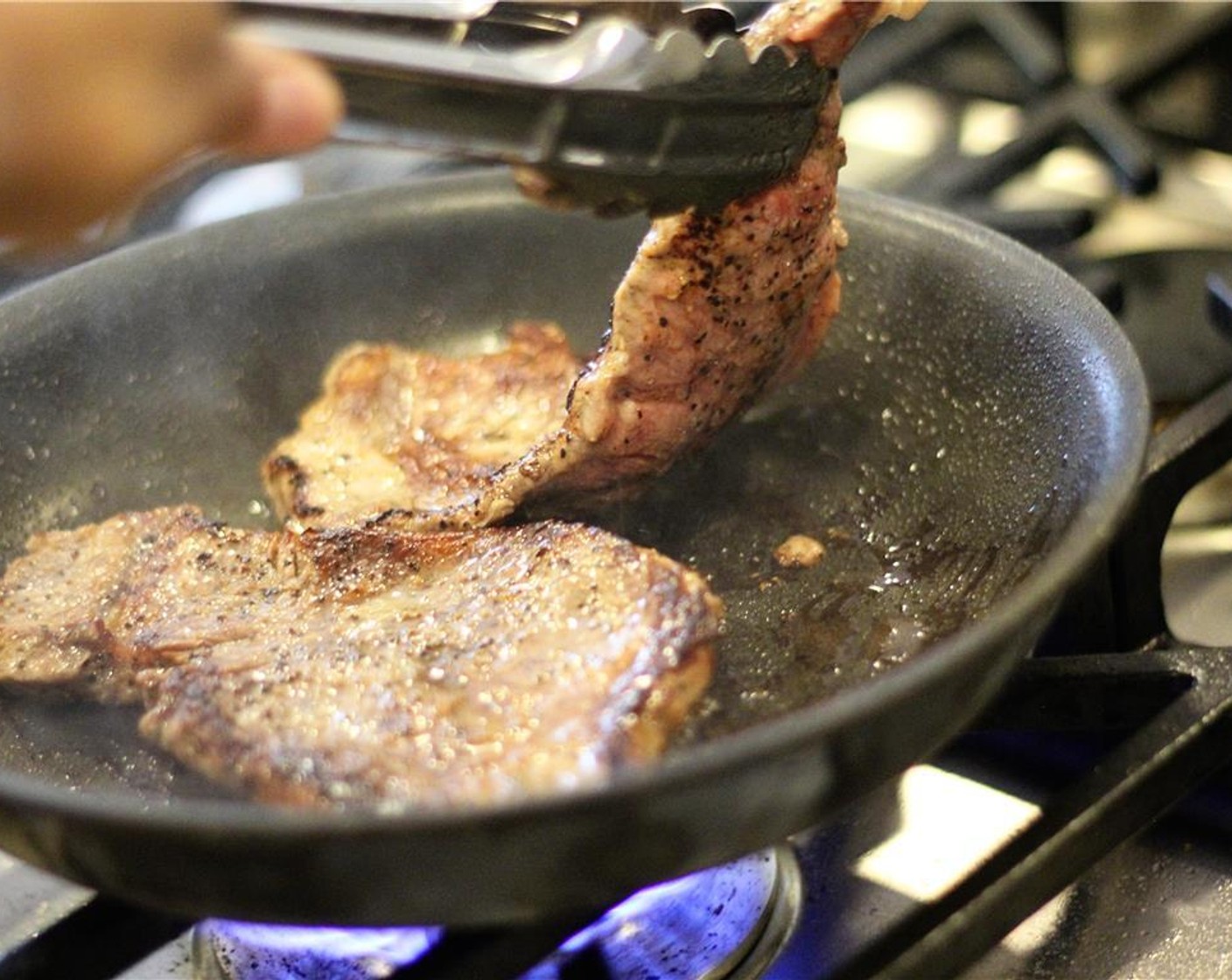 step 5 Cook each steak for 7-10 minutes for medium-rare to medium, or to the desired doneness, turning once. When steaks are done cooking, transfer steaks to a plate and cover to keep warm.