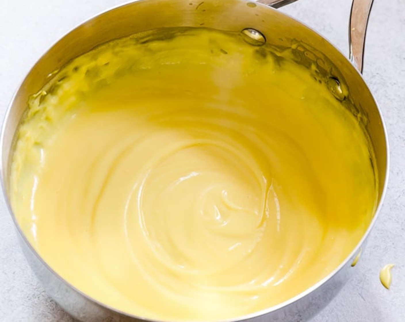 step 16 Transfer to a clean bowl and set it over ice bath to cool. Cover with plastic wrap so that it touches the cream and refrigerate it.