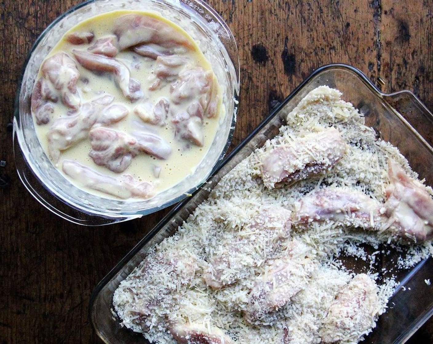 step 5 Toss to coat, then transfer a few at a time to the panko-parmesan pan. Coat in the crumbs, pressing them to adhere, then transfer to the clean sheet pan. At this point, the breaded strips of chicken can be refrigerated for up to a day.