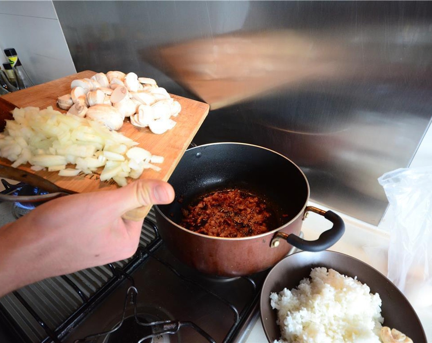 step 5 Turn down the heat to low and add the onion and fry until translucent.