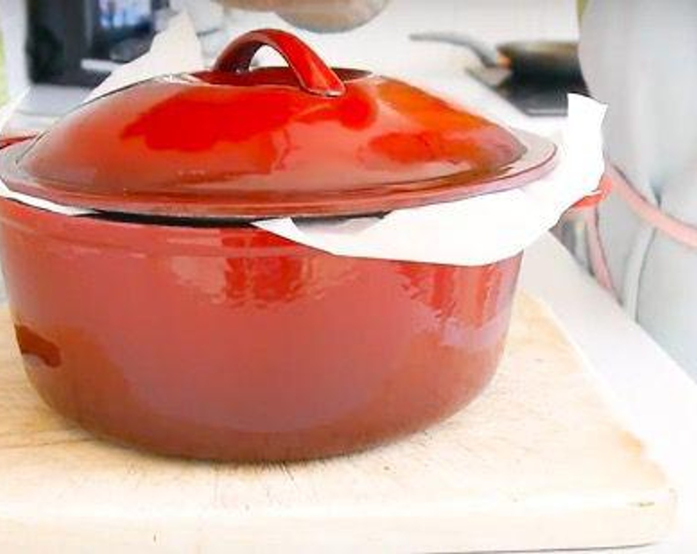 step 5 When the oven and pot are hot place the dough ball with the parchment paper in the pot cover with the lid and place in the oven and bake for 30 minutes.