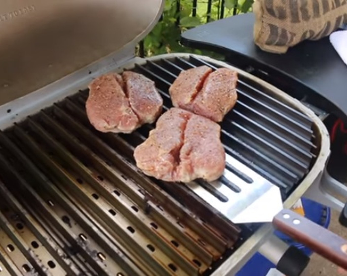 step 7 Flip each chop over and move to the indirect side of the grill. Continue to cook until the internal temperature reaches 130 degrees F (54 degrees C).